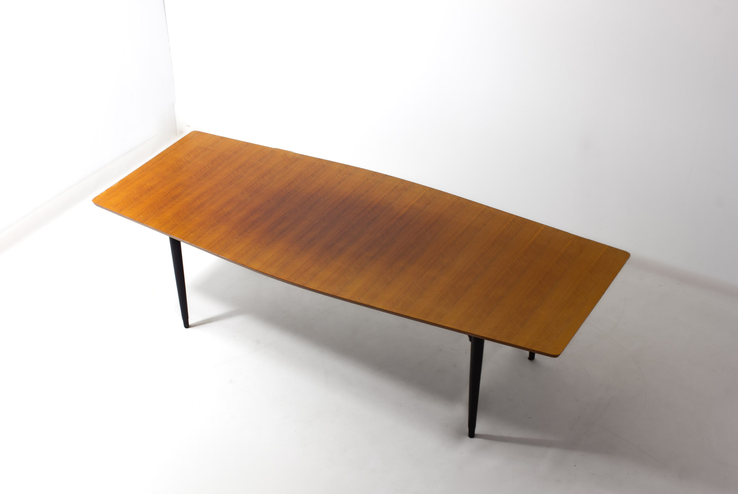 Rounded mid-century dining table